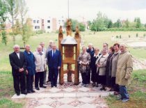 With classmates at the wayside shrine for pupils who raised a national flag in Joniškėlis, 1957.