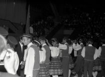 The beginning of the academic year of KPI at Kaunas Sports Hall, 1966. The members of &ldquo;Nemunas&rdquo; present the student caps to the first-year students. (KTU Museum)