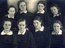 Students of Raseiniai Gymnasium, 1938. E. Sto&scaron;kutė is the 3rd from the left in the 2nd row. (photograph by M. Liudginas) (E. Grinienė family archive)