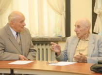 Prof. J. Slavėnas has a discussion with the Emeritus Club President Assoc. Prof. J. Deltuva, 2009. (the original photograph is at KTU Photo Archive)