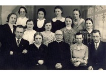 Pupils of the 8b grade of the Rygi&scaron;kiai Jonas Gymnasium with their class teacher M. Katilius,1935. V. Jasiukevičius is the 1st from the left in the second row of desks (family archive of L. Kudarienė)