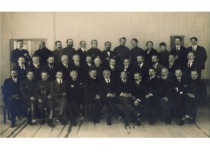 Teachers of the Higher Courses, 1921. 1st row (from the left): P. Juodakis, J. Žilinskas, M. Nasvytis, S. Digrys, A. Janulaitis, J. Vabalas-Gudaitis, E. Volteris, Z. Žemaitis, V. Čepinskis, J. &Scaron;imoliūnas, P. Jodelė, V. Verbickis, K. Vasiliauskas. 2nd row: V. La&scaron;as, P. Jankauskas, L. Gogelis, P. Leonas, P. Raudonikis, A. Jurgeliūnas, J. Karuža, P. Dovydaitis, V. Dubas, J. Čiurlys, M. Songaila, K. Lapinas, K. Oželis. 3rd row: unidentified person, V. Vir&scaron;ila, unidentified person, V. Birži&scaron;ka, A. Purėnas, N. &Scaron;apira, L. Vailionis, S. Dirmantas, J. Čeponis, J. Bubenaitė (Čeponienė), A. Ve&scaron;karčaitė, J. Gravrogkas, F. Butkevičius. (the original photograph is at KTU Museum)