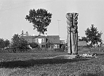 A column shrine to Prof. K. Bar&scaron;auskas at his birthplace in Gižai, 1970. (photograph by R. Žiemys, the original photograph is at KTU Archive)