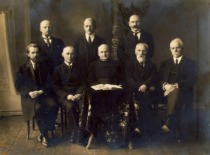 The Senate of the University of Lithuania, 1924. Seated in the 1st row (from the left): Dean of the Faculty of Humanities Prof. Mykolas Birži&scaron;ka, Vice-Rector Prof. Petras Avižonis, Rector Prof. Pranci&scaron;kus Būčys, Dean of the Faculty of Technology Prof. Pranas Jodelė, Dean of the Faculty of Law Prof. Petras Leonas. Standing in the 2nd row (from the left): Dean of the Faculty of Mathematics and Nature Prof. Zigmas Žemaitis, Secretary Prof. Antanas Purėnas, Dean of the Faculty of Medicine Prof. Vladas La&scaron;as. (the original photograph is at KTU Museum)