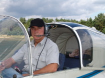 Prof. A. Fedaravičius on a plane at the S. Darius and S. Girėnas Aerodrome, 2005 (Prof. A. Fedaravičius Family Archive)