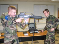 Officer cadets from the Saint-Cyro Military Academy (France) using laser rifle simulators in the laboratory of the KTU Institute of Defense Technologies, 2009 (KTU Museum)