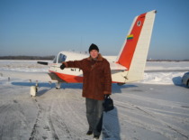 Prof. A. Fedaravičius next to an airplane in 2009 (Prof. A. Fedaravičius family archive)