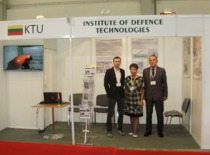 S. Račkauskas, L. Pata&scaron;ienė, and A. Fedaravičius, staff members of the KTU Institute of Defense Technologies, at the institute&rsquo;s booth at the &ldquo;MSPO-2014&rdquo; military exhibition in Kielce (Poland), 2014 (KTU Museum)