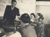 M. Podelskis is defending his thesis in 1953. Seated at the table on the right are V. Zelionkaitė and E. Grinienė. (From the family archives of Prof. V. Zelionkaitė)